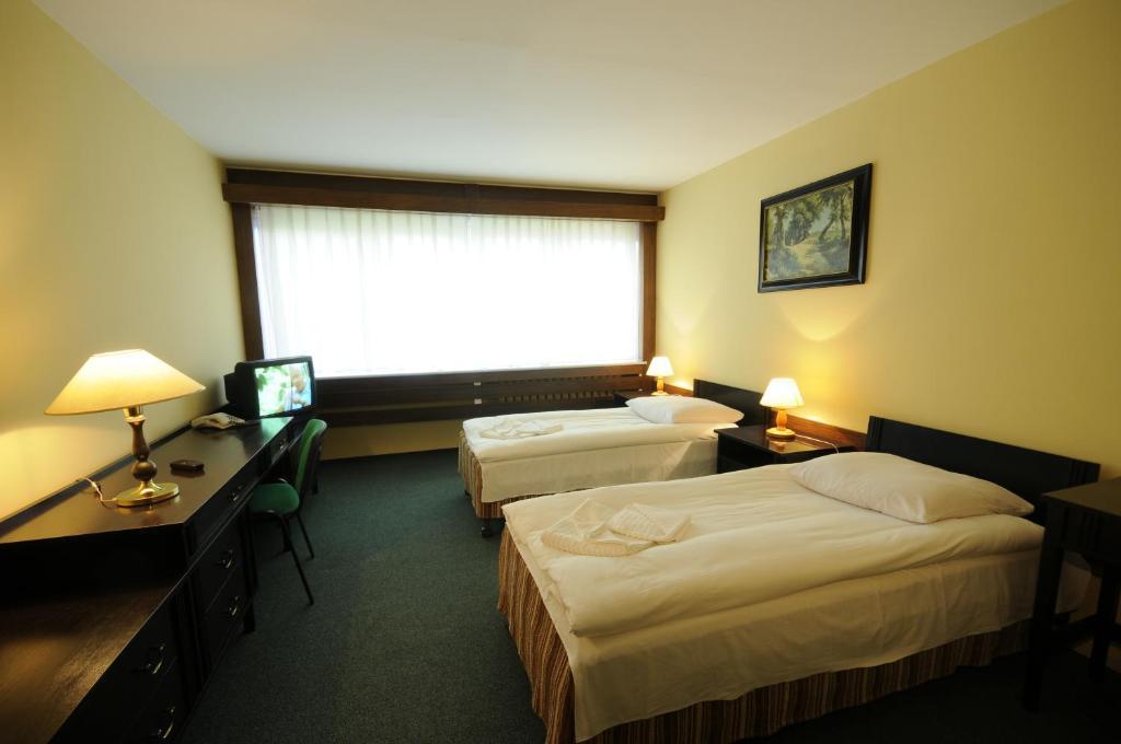 Olimpia Lejlighedshotel Poznań Værelse billede