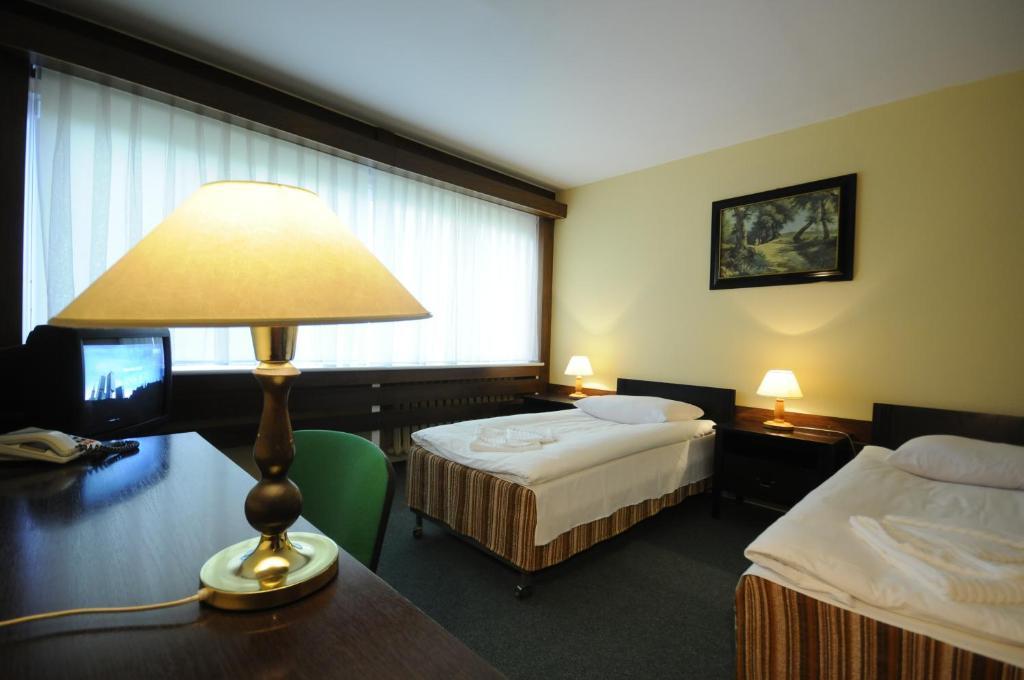 Olimpia Lejlighedshotel Poznań Værelse billede